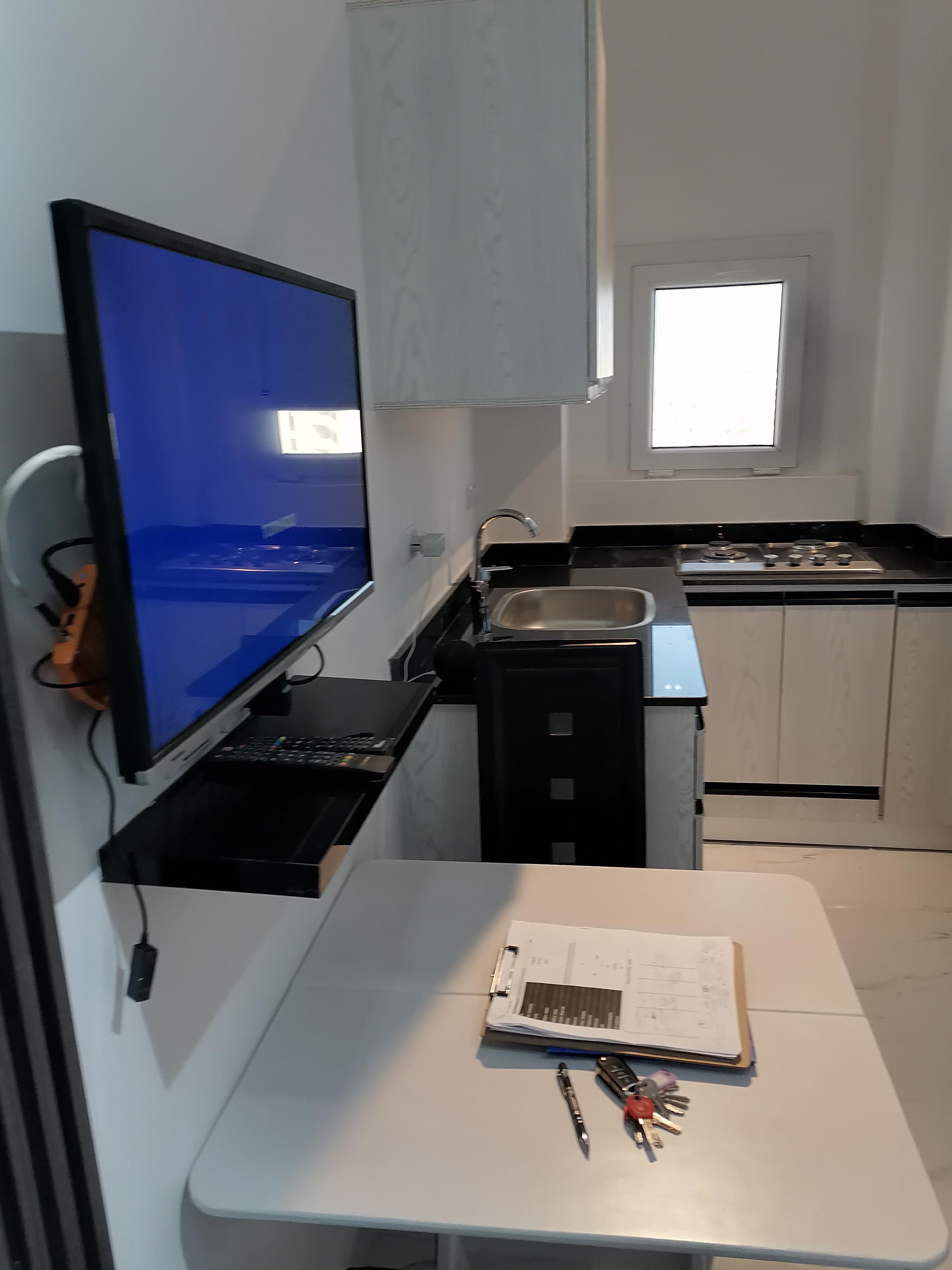 Futuristic 35m² Smart Studio with Sea & Pool Views in Oasis Compound – Fully Furnished with Alexa Control