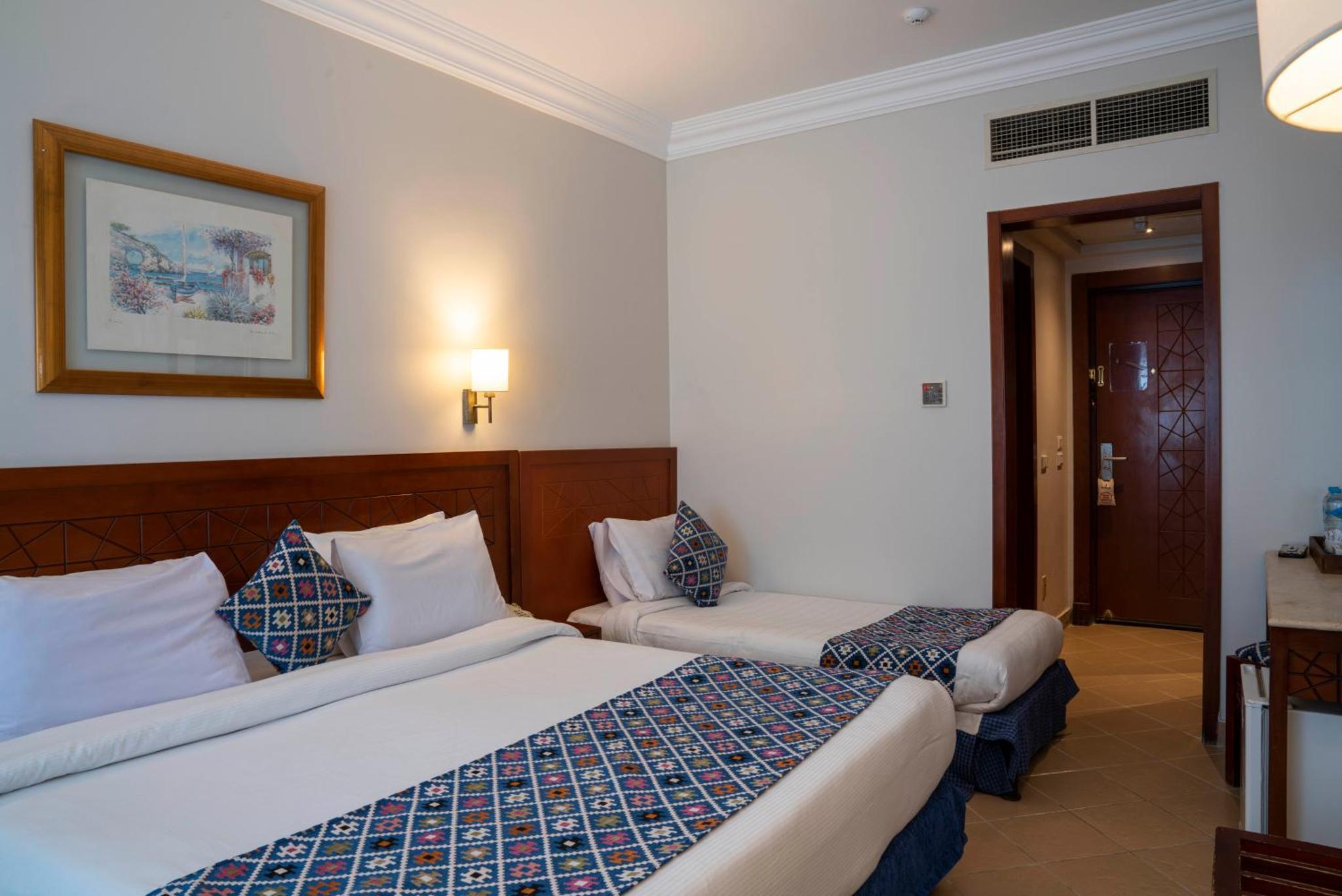 Deluxe Room with  Partial Sea View